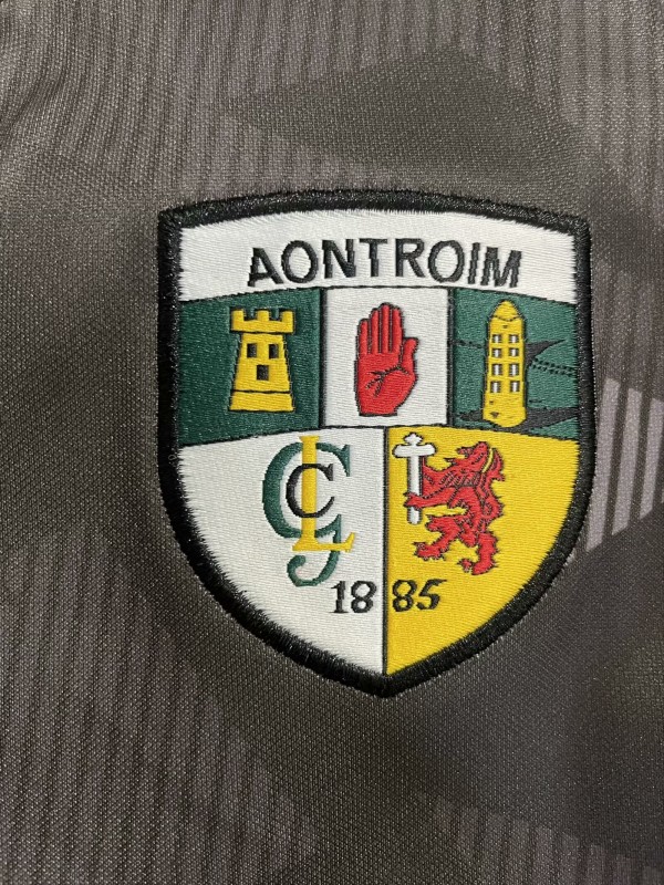 25/26 Antrim GAA Black with Amber and Red Sleeves Jersey