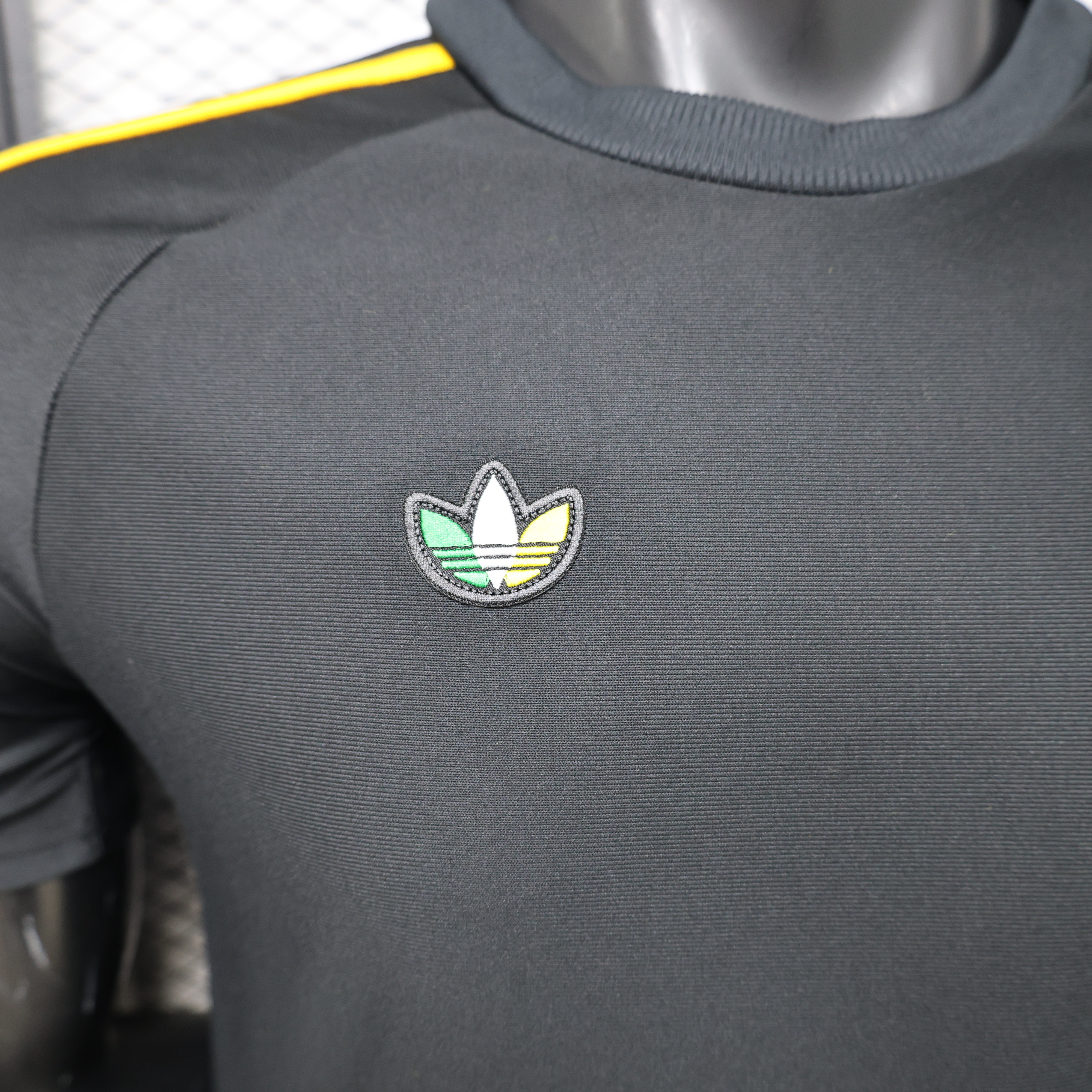 Player Version 26/27 Celtic Black with Asymmetric Yellow & Green Stripe Jersey